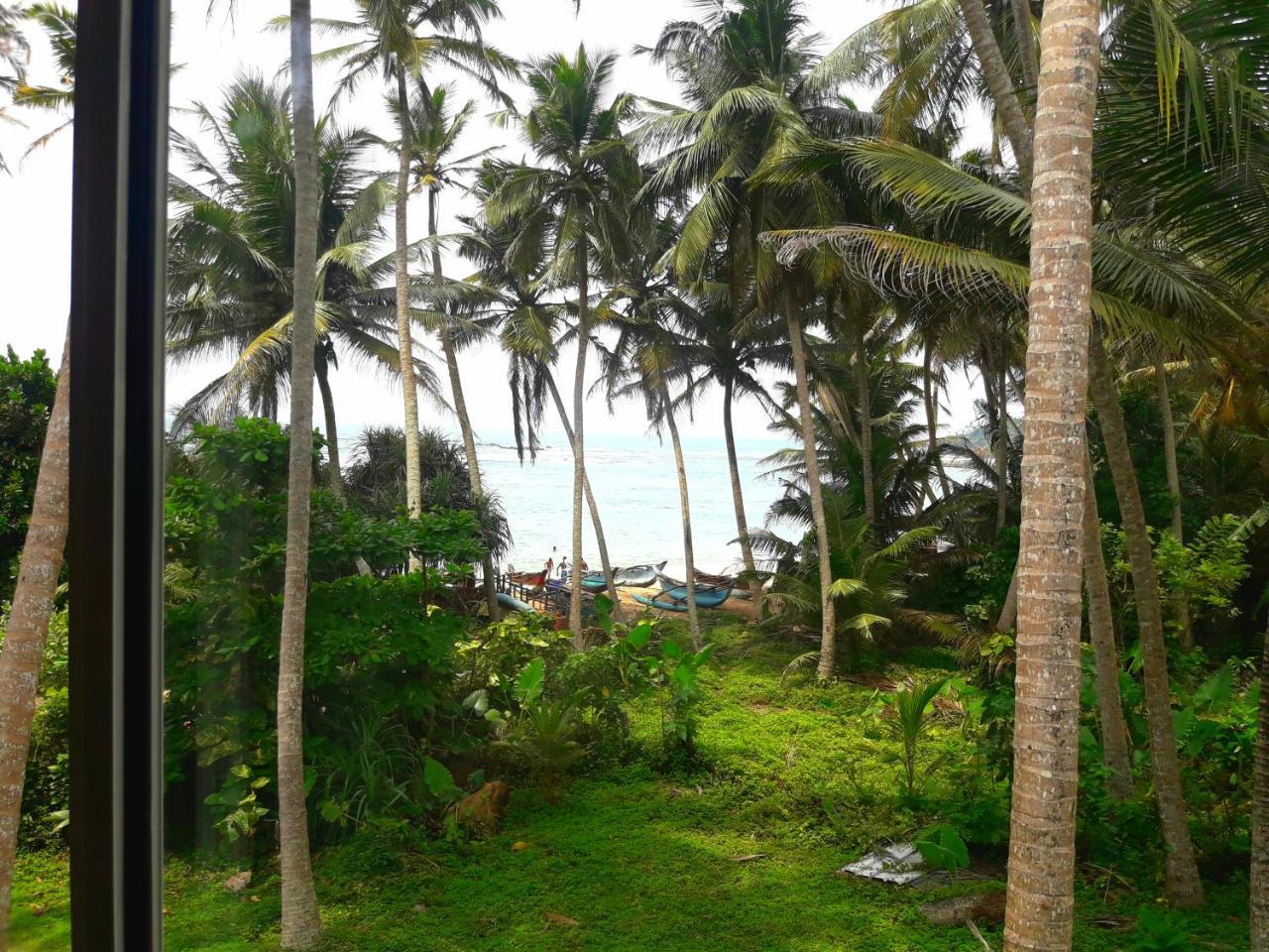 Sunray Rest - Beach View Homestay Mirissa Bagian luar foto