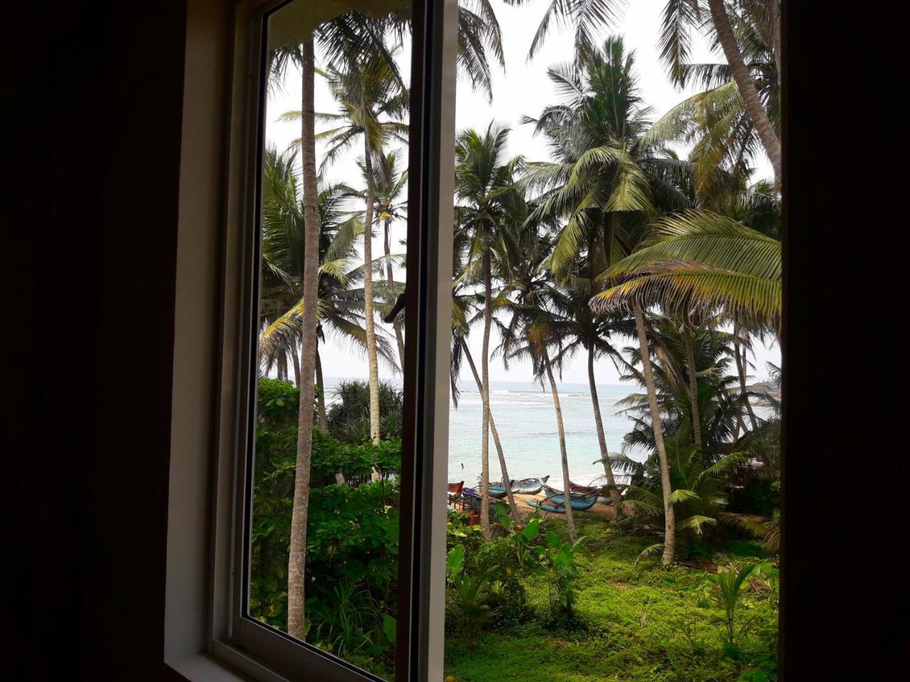 Sunray Rest - Beach View Homestay Mirissa Bagian luar foto
